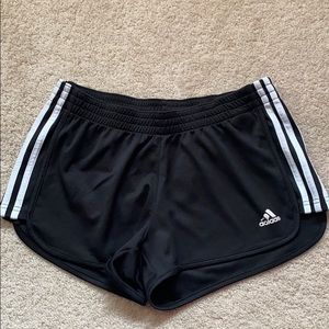 Adidas black with white stripes on the sides